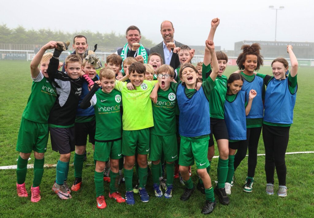 Football fan Prince William hits the road to see how the local community have made playing the game easier in Cornwall